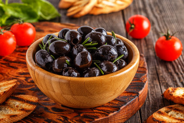 Fresh olives with toasted baguette.