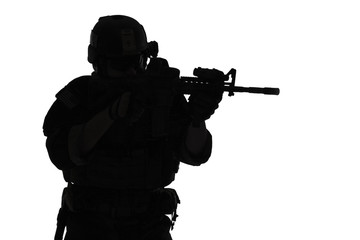 United states Marine Corps special operations command Marsoc raider with weapon aiming a gun....