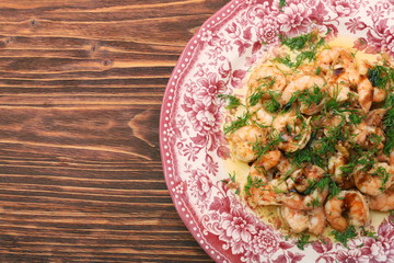 Tasty grilled shelled pink shrimps