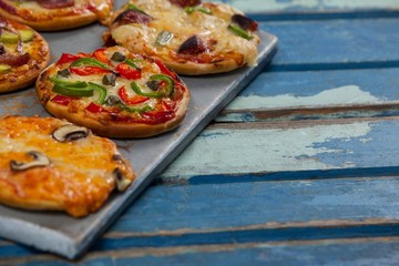 Various delicious italian pizza served on pizza tray