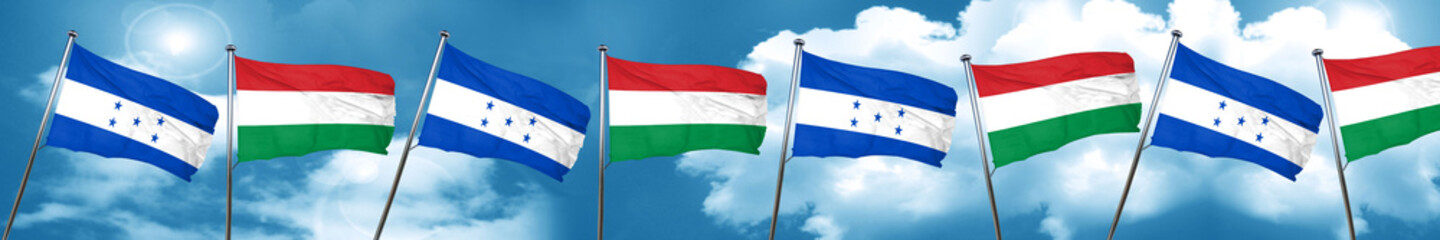 Fototapeta na wymiar Honduras flag with Hungary flag, 3D rendering