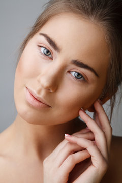 Studio portrait of beautyful woman with natural make-up