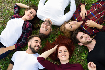 Group of young people together outdoors in urban background