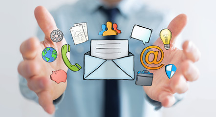 Businessman holding manuscript contact icon in his hand