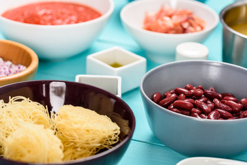 Red Kidney Beans And Food Ingredients On Turquoise Kitchen Table