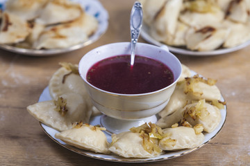 beetroot soup with dumplings / pierogis