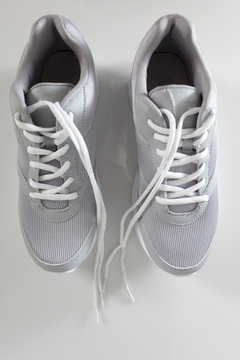 gray sneakers with laces