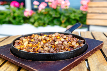 The Azerbaijan cuisine. Fried potatoes with meat and liver