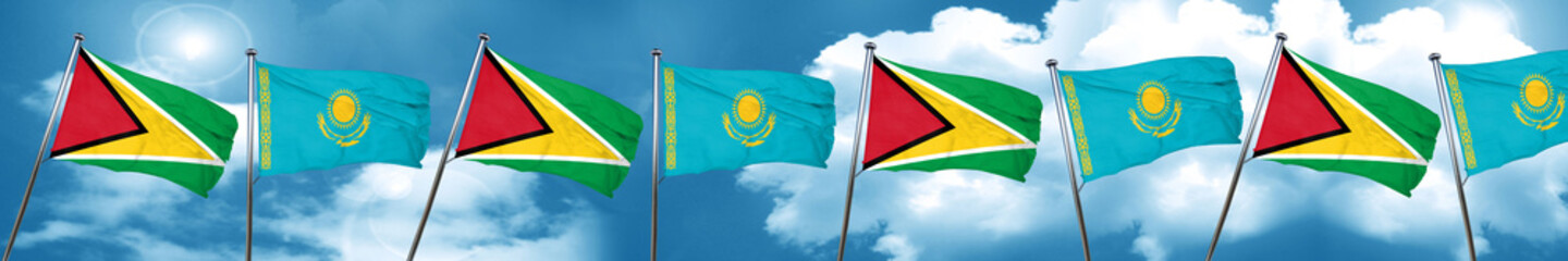 Guyana flag with Kazakhstan flag, 3D rendering