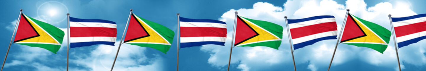 Guyana flag with Costa Rica flag, 3D rendering