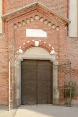 Fototapeta na wymiar entrance portal of Monlue abbey, Milan, Italy