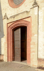 entrance portal of church at Mirasole abbey, Milan, Italy