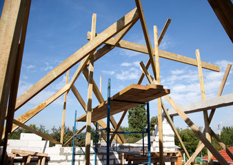 Building a new home with wooden rafters.