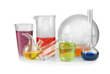 Different chemical glassware with color water on white background