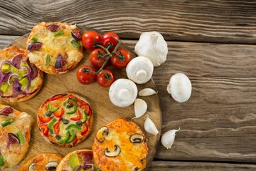 Various pizza with tomatoes and garlics