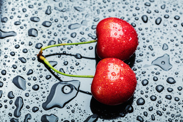 Two juicy fresh wet cherries