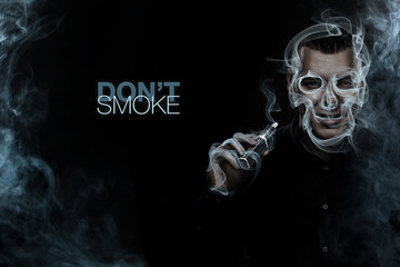 Men vaping and releases a vapor cloud in the form of skull. Social advertisement concept