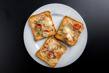 Grilled toast with camembert and cherry tomatoes