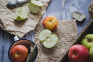 Apple on wooden board outdoors