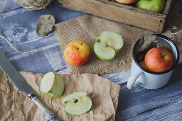 Apple on wooden board outdoors