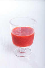 Single glass of straberry cocktail