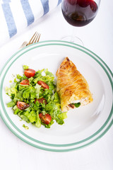 Chicken breast in french pastry with fresh salad