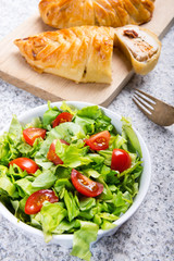 Chicken breast in french pastry with fresh salad