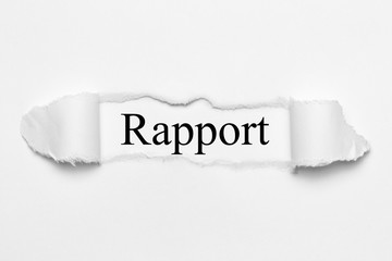 Rapport on white torn paper