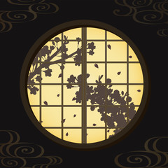 丸窓に映る桜の景色