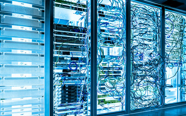 Big data dark serer room with bright equipment