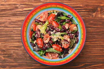 Tuna salad with beans and cherry tomatoes. Low calories heathy eating concept.