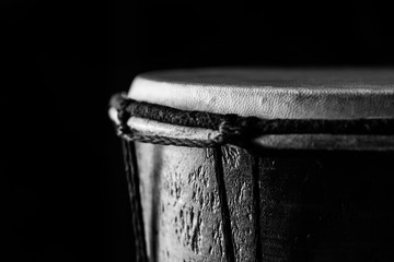Playing African Drums in Low Key Single Light by Musician in Mus