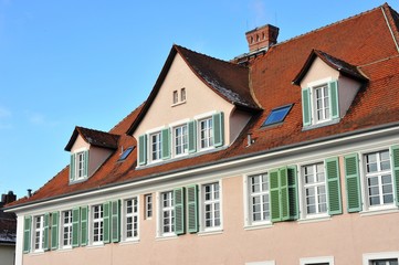 Renovated House-Front with Dormer Windows (Gauben) at tiled Roof (Ziegeldach)