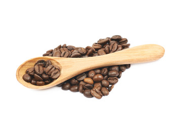 Heart shaped pile of coffee beans isolated