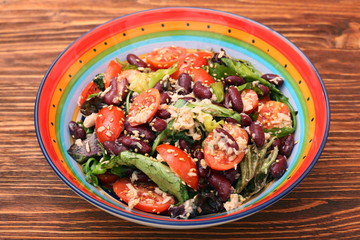 Tuna salad with beans and cherry tomatoes. Low calories heathy eating concept.