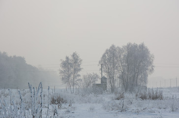 Guard tower in fog in winter