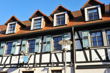 Renovated House-Front with Dormer Windows (Gauben) at tiled Roof (Ziegeldach)