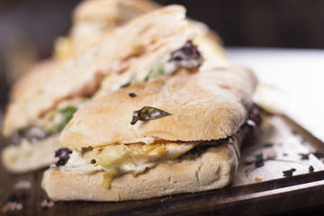 Close up of delicious sandwiches.  Beautifully served meal at the restaurant.