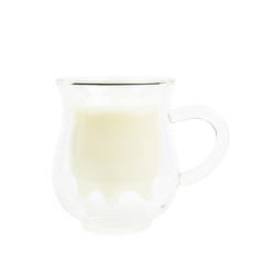 Cow's udder shaped glass cup isolated