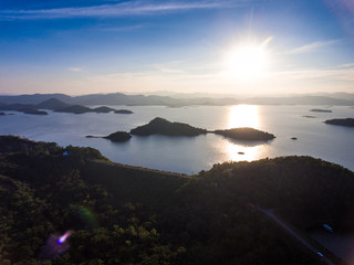Aerial view of beautiful sunset in lake with small island