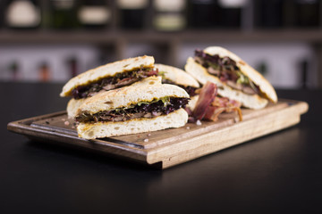 Close up of delicious sandwiches.  Beautifully served meal at the restaurant.