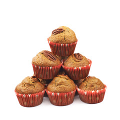 Pile of pecan nut cupcakes isolated