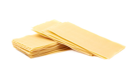Pile of dried lasagna sheets isolated