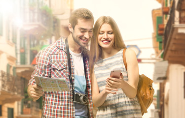 Young couple on beautiful cityscape background