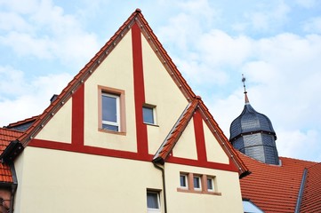 Renovated House-Front with Dormer Windows (Gauben) at tiled Roof (Ziegeldach)