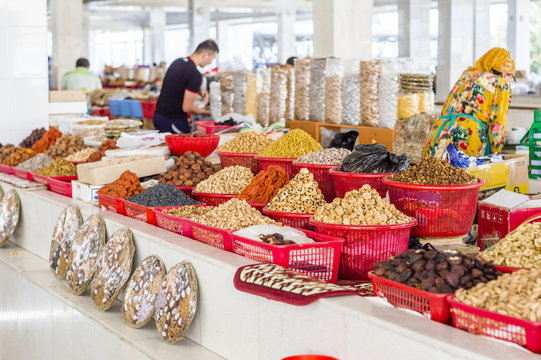 The stall with dried fruits at the Siab Dekhkhan Bazaar offers different raisins, apricots, prums and figs in Samarkand, Uzbekistan