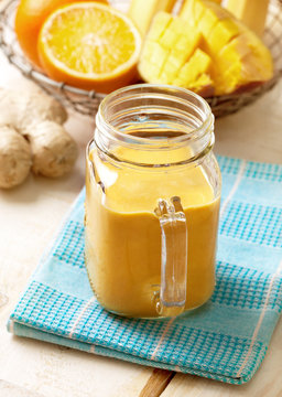 detox smoothie of banana, orange, mango, ginger