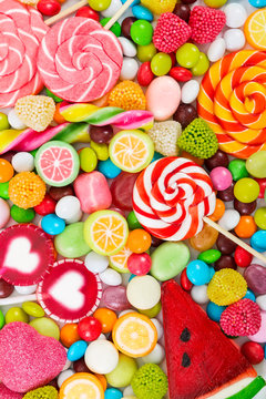 Colorful lollipops and candy. Top view.
