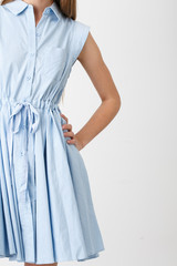 The girl in a blue dress