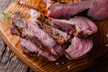 Barbecue bone ribeye steak on wooden board